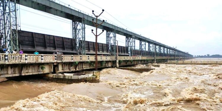 Saptakosi River, water level, Kosi Barrage, cusecs, monsoon rains, floodgates, embankment, Dharan, Amit Yadav
