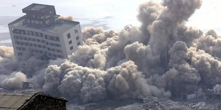 Residents Of Fengjie In Southwest Chinas Chongqing Watch The Demolition Of Buildings In Their Town On November 4 2002 To Make Room For The Three Gorges Dams Resevoir.